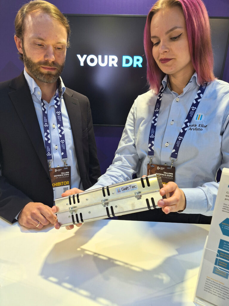 GaltTec cofounders Glen and Laura demonstrating fuel cell mockup.